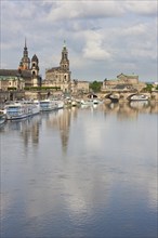 Cruise ship on the river Elbe in front of the skyline of Dresden with the opera and cathedral