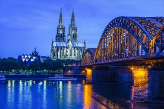 Hohenzollern Bridge and Cologne Cathedral on the Rhine at night