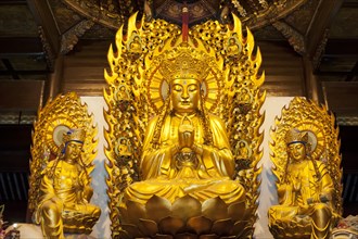 Three golden Buddhas