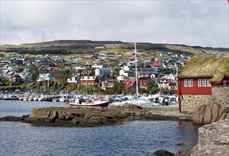 Colorful houses and small boats in the harbor