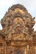 Bas-relief made of sandstone above the entrance of the southern library next to the Prasat