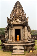 Monk at the entrance to the main portal