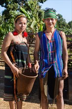 Phnong woman and man in traditional costume