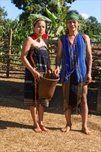 Phnong woman and man in traditional costume