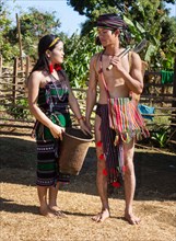 Phnong woman and man in traditional costume