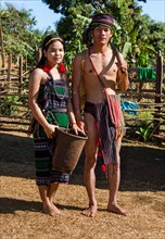 Phnong woman and man in traditional costume