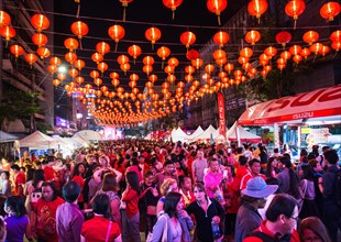 Red chinese lanterns in crowded Yaowarat Road