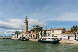 Lighthouse on the banks of a canal