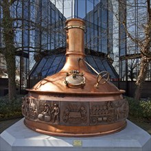 Brewing kettle in front of the administration of the Warsteiner Brewery