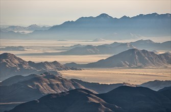 Isolated mountain ridges at edge of Namib Desert