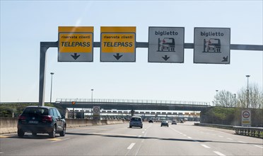 Signs of a toll checkpoint on a northern Italian highway