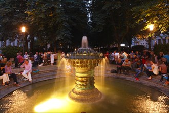 Lighted fountain with beer garden in Adolfsallee