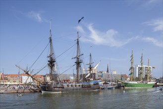 Gotheborg sailing ship with hospitality ship Alexander von Humboldt II with launch in the Neuer Hafen harbour at the Sail 2015 festival