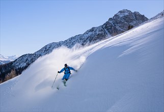 Freerider off-piste in deep snow