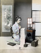 Geisha writing letter