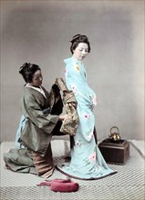 Tying kimono belt