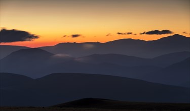 Views of the Sibillini Mountains at sunrise from Monte Serrasanta