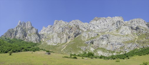 Limestone wall Picos de Europa and Pena Remona mountain peak