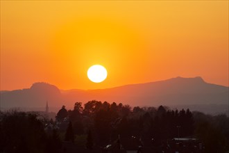 Sunset between the Hohentwiel and Hohenstoffeln mountains in the Hegau