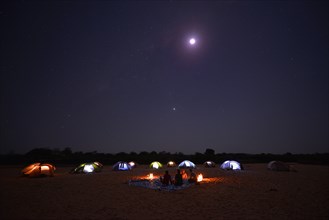A camp on the Tsiribihina River at night