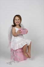 Girl dressed as angel