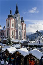 Christmas market in front of the Mariazell Basilica on the main square of Mariazell