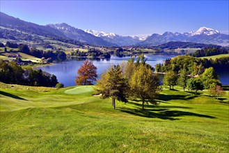Golf course on the Lake of Gruyere or Lac de la Gruyere