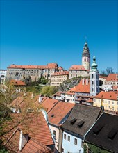 View of Cesky Krumlov Castle and the Church of St. Jost on the Vltava River