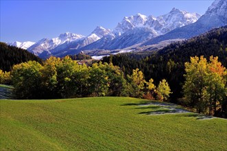 Lower Engadine in autumn with snowy mountains