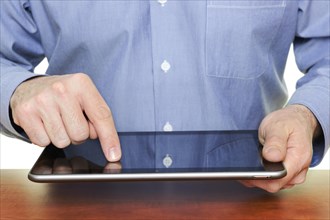 Man using a tablet computer