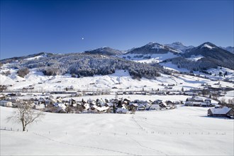 The village of Urnasch with Mt Alpstein