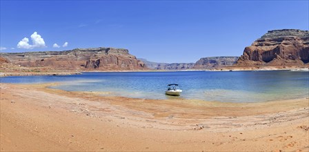 Small boat on the shore of Lake Powell