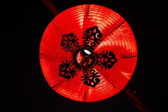Red Chinese paper lantern with ornaments