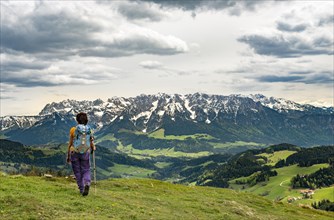 Female hiker on the hiking trail to Spitzstein