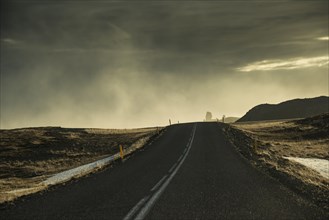 Deserted country road during rainfall