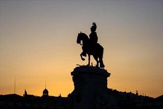 Silhouette of the equestrian statue of Jose I at sunset