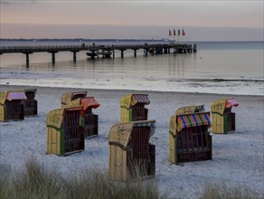 Beach chairs on the beach at dusk