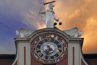 Astronomical clock with a statue of Justice on the Baroque town hall of Bad Windsheim