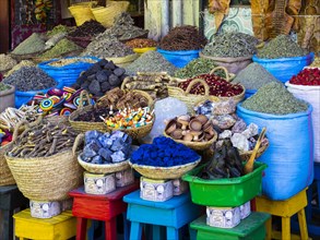 Spices are on sale in baskets