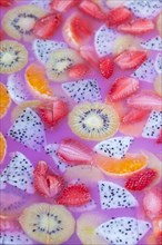 Jelly dessert with colourful fruits