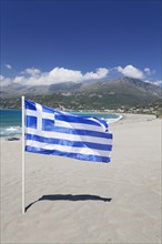 Flag on the beach of Plakias