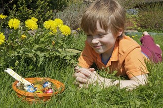 Boy found Easter eggs in Easter basket