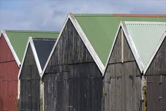 Coloured boathouses