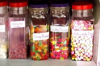 Candy jars with various sweets