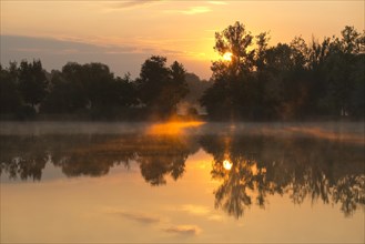 Sunrise over a pond