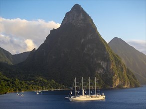 Sailing cruise ship Wind Star of Windstar Cruises in front of the volcanoes Gros Piton and Petit Piton