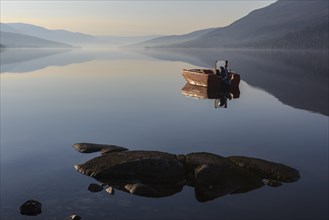 Fishing boat on Loch Arkaig in the early morning