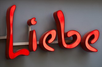 Neon sign with the word 'Liebe'