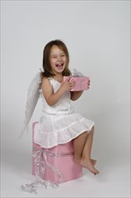 Girl dressed as angel