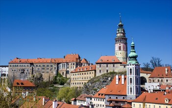 St. Jost Church in front of Cesky Krumlov Castle with the castle tower